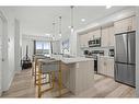 411-40 Carrington Plaza Nw, Calgary, AB  - Indoor Photo Showing Kitchen With Stainless Steel Kitchen With Upgraded Kitchen 