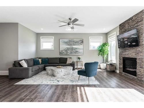 51 Carrington Crescent Nw, Calgary, AB - Indoor Photo Showing Living Room With Fireplace