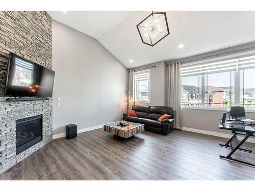 51 Carrington Crescent Nw, Calgary, AB - Indoor Photo Showing Living Room With Fireplace