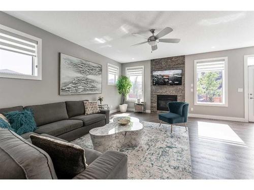 51 Carrington Crescent Nw, Calgary, AB - Indoor Photo Showing Living Room With Fireplace