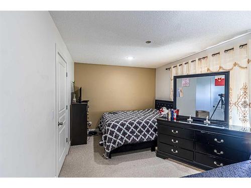 3 Bridleridge View Sw, Calgary, AB - Indoor Photo Showing Bedroom