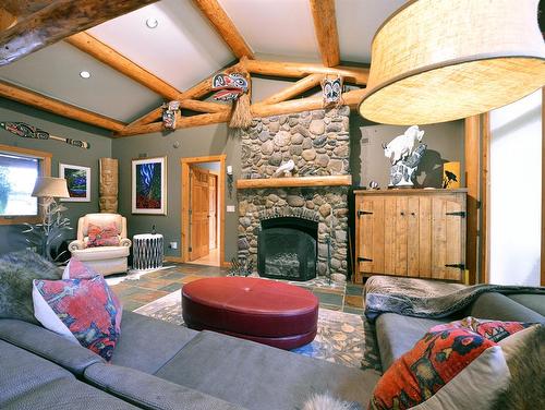 21 Chinook Ridge, Rural Foothills County, AB - Indoor Photo Showing Living Room With Fireplace