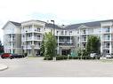 1204-1140 Taradale Drive Ne, Calgary, AB  - Outdoor With Balcony With Facade 