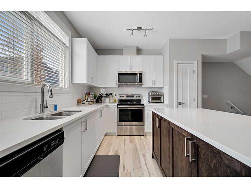 66 Sage Bluff Circle Nw, Calgary, AB - Indoor Photo Showing Kitchen With Stainless Steel Kitchen With Upgraded Kitchen