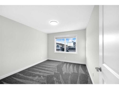 1153 Cranbrook Gardens Se, Calgary, AB - Indoor Photo Showing Other Room