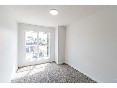 206 Lucas Close Nw, Calgary, AB - Indoor Photo Showing Other Room