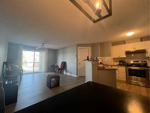 1207-8810 Royal Birch Boulevard Nw, Calgary, AB - Indoor Photo Showing Kitchen