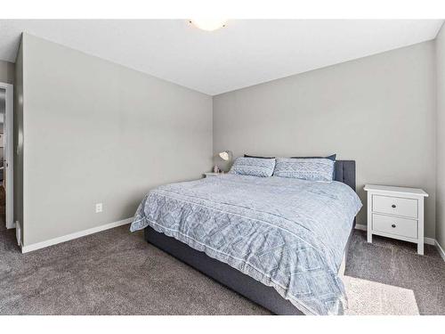 23 Belmont Gardens Sw, Calgary, AB - Indoor Photo Showing Bedroom