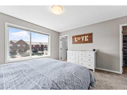 23 Belmont Gardens Sw, Calgary, AB - Indoor Photo Showing Bedroom