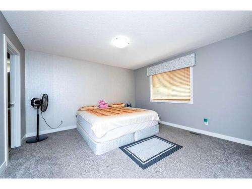 1953 New Brighton Drive Se, Calgary, AB - Indoor Photo Showing Bedroom