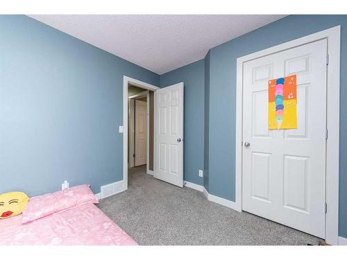 1953 New Brighton Drive Se, Calgary, AB - Indoor Photo Showing Bedroom