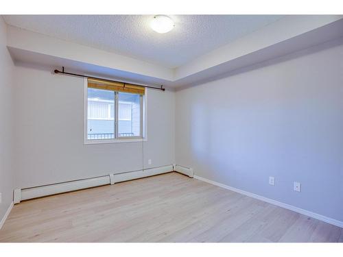 205-15 Saddlestone Way Ne, Calgary, AB - Indoor Photo Showing Other Room