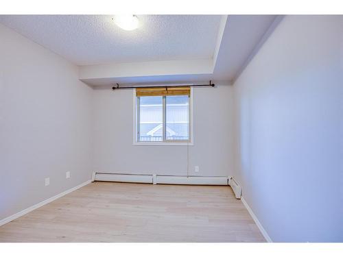 205-15 Saddlestone Way Ne, Calgary, AB - Indoor Photo Showing Other Room