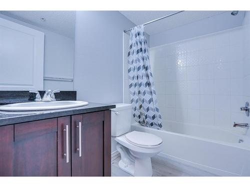 205-15 Saddlestone Way Ne, Calgary, AB - Indoor Photo Showing Bathroom