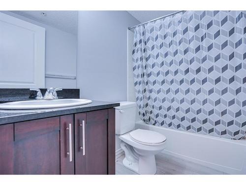 205-15 Saddlestone Way Ne, Calgary, AB - Indoor Photo Showing Bathroom