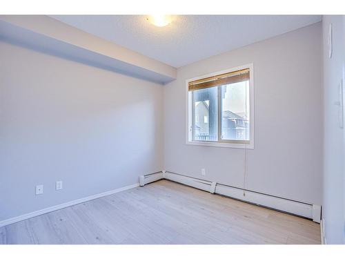 205-15 Saddlestone Way Ne, Calgary, AB - Indoor Photo Showing Other Room