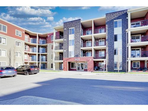 205-15 Saddlestone Way Ne, Calgary, AB - Outdoor With Balcony With Facade