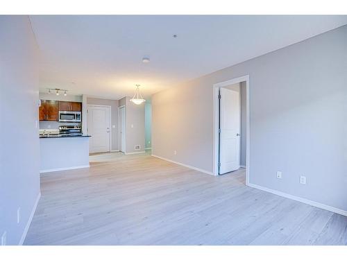 205-15 Saddlestone Way Ne, Calgary, AB - Indoor Photo Showing Kitchen