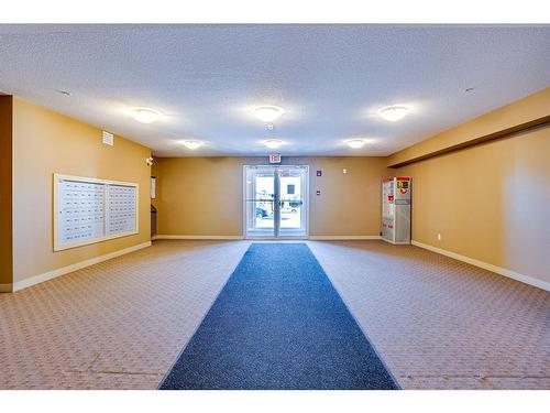 205-15 Saddlestone Way Ne, Calgary, AB - Indoor Photo Showing Other Room