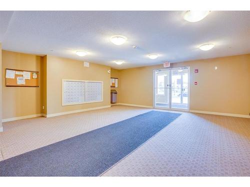 205-15 Saddlestone Way Ne, Calgary, AB - Indoor Photo Showing Other Room