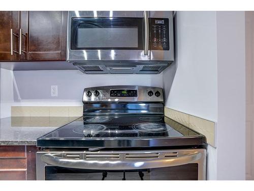 205-15 Saddlestone Way Ne, Calgary, AB - Indoor Photo Showing Kitchen