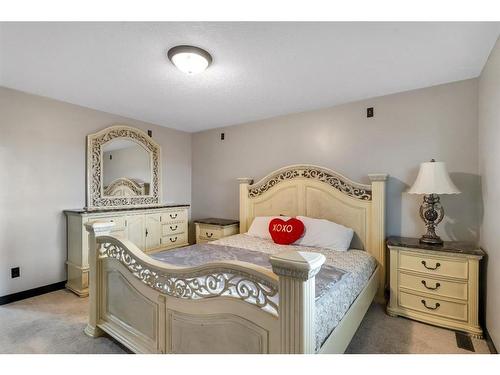 16 Nolanfield Crescent Nw, Calgary, AB - Indoor Photo Showing Bedroom