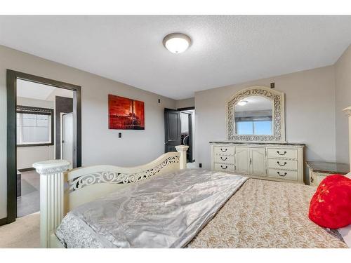 16 Nolanfield Crescent Nw, Calgary, AB - Indoor Photo Showing Bedroom