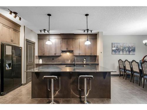 16 Nolanfield Crescent Nw, Calgary, AB - Indoor Photo Showing Kitchen With Upgraded Kitchen
