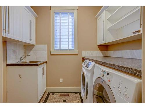 2719 Evercreek Bluffs Way Sw, Calgary, AB - Indoor Photo Showing Laundry Room