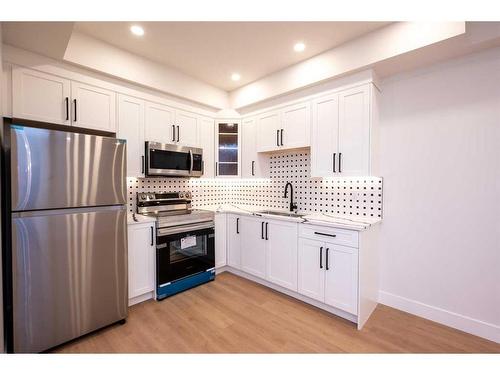 1828 19 Avenue Nw, Calgary, AB - Indoor Photo Showing Kitchen With Stainless Steel Kitchen With Upgraded Kitchen