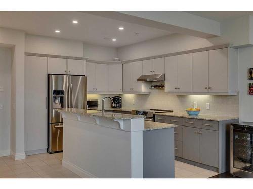 2307-10221 Tuscany Boulevard Nw, Calgary, AB - Indoor Photo Showing Kitchen With Upgraded Kitchen