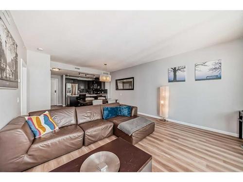 1702-1410 1 Street Se, Calgary, AB - Indoor Photo Showing Living Room