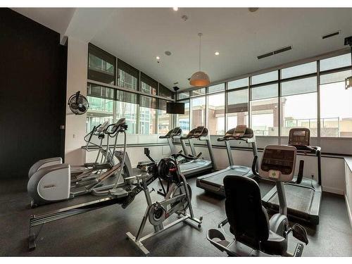 1702-1410 1 Street Se, Calgary, AB - Indoor Photo Showing Gym Room