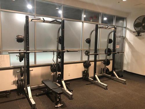 1702-1410 1 Street Se, Calgary, AB - Indoor Photo Showing Gym Room