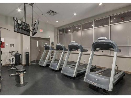 1702-1410 1 Street Se, Calgary, AB - Indoor Photo Showing Gym Room