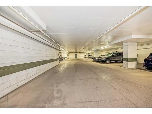 1702-1410 1 Street Se, Calgary, AB - Indoor Photo Showing Garage