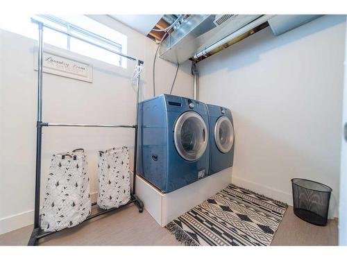 36 Hidden Point Nw, Calgary, AB - Indoor Photo Showing Laundry Room