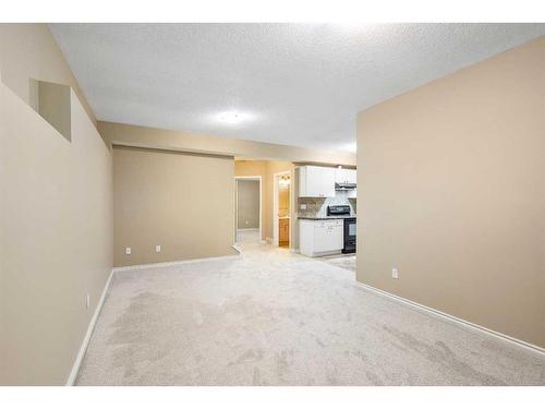 23 Taracove Estate Drive Ne, Calgary, AB - Indoor Photo Showing Other Room