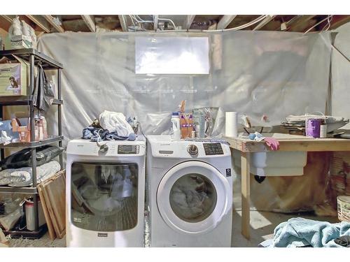 114 7 Avenue Nw, Calgary, AB - Indoor Photo Showing Laundry Room