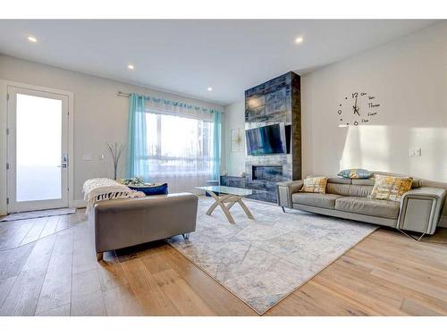 419 36 Street Sw, Calgary, AB - Indoor Photo Showing Living Room With Fireplace