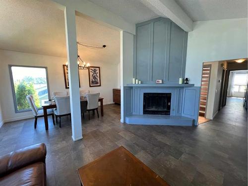 123 Edgepark Boulevard Nw, Calgary, AB - Indoor Photo Showing Living Room With Fireplace