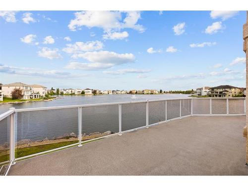 147 Coral Shores Landing Ne, Calgary, AB - Outdoor With Body Of Water With View