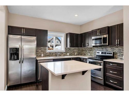41 Legacy Common Se, Calgary, AB - Indoor Photo Showing Kitchen With Stainless Steel Kitchen With Upgraded Kitchen