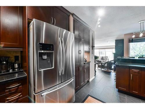 18-1220 Prominence Way Sw, Calgary, AB - Indoor Photo Showing Kitchen With Stainless Steel Kitchen
