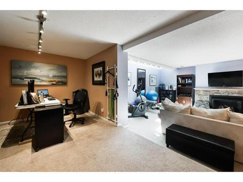 18-1220 Prominence Way Sw, Calgary, AB - Indoor With Fireplace