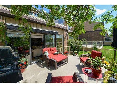18-1220 Prominence Way Sw, Calgary, AB - Outdoor With Deck Patio Veranda With Exterior