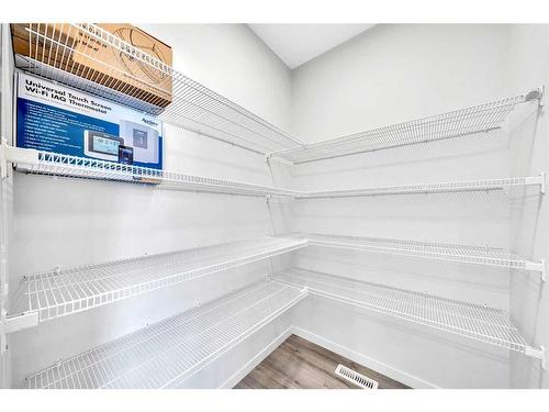 69 Edith Mews Nw, Calgary, AB - Indoor With Storage