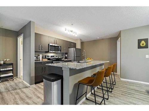 2220-4641 128 Avenue Ne, Calgary, AB - Indoor Photo Showing Kitchen With Stainless Steel Kitchen With Upgraded Kitchen