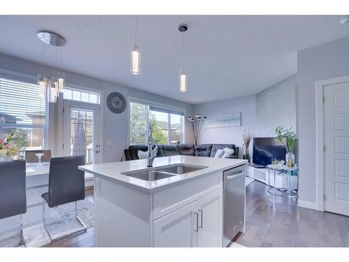 64 Evansglen Close Nw, Calgary, AB - Indoor Photo Showing Kitchen With Double Sink