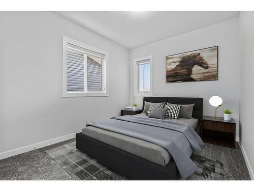 113 Amblehurst Rise Nw, Calgary, AB - Indoor Photo Showing Bedroom